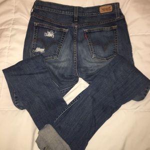 Levi’s- Distressed boyfriend jeans